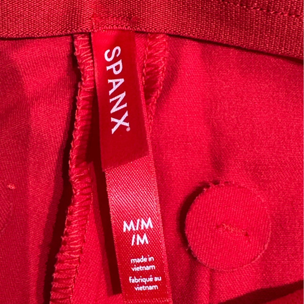 SPANX slip on kick flare pants in a true red color